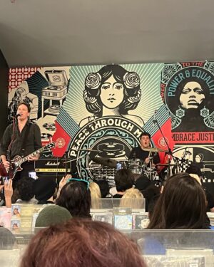 April Schutte Instagram - Well, I finally got to see @dogstarband live 😭 What a gift! (Swipe!) Thank you to @bretdomrose @robmailhouse and Keanu Reeves for giving us this special show at @amoebahollywood !!! I’m forever grateful to my pal, Jax for getting my cd/ticket for me and for @vanessaburgundy for the heads up that the show was happening!! I had to hold back some happy tears but I just kept singing and dancing!!! Hope to get another chance to see them in the future!
.
.
.
#Dogstar #keanu #amoebamusic #bretdomrose #robmailhouse #rockshow