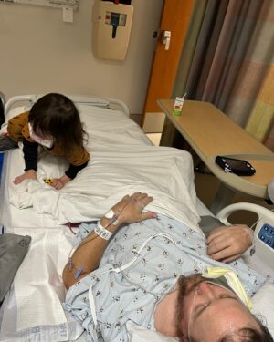 April Schutte Instagram - Shawn is home! Home with us and recovering ❤️‍🩹 This was the hardest and worst week ever…One week ago, Wednesday evening we went to the ER because Shawn had extreme stomach pain that wouldn’t stop and kept worsening. Hours of waiting lead to them finally diagnosing him with appendicitis (I had assumed this hours before but we were hoping it was food poisoning). They decided they needed to do surgery the next day and in the meantime kept pumping him full of antibiotics and pain meds (which did nothing the first day!) They then kept pushing his surgery back and as the time passed, his pain and swelling got worse and worse. They finally went in and his appendix had perforated just as they were starting to remove it! Once in recovery, there were some minor issues that are too gross to mention…then on the other side of surgery, there were SO many things that kept happening to make this a lot more challenging (and painful) than the average appendectomy. His organs were “dormant” and wouldn’t wake up and function properly…his belly bloated up so badly, causing even more pain, he couldn’t even keep water down without painfully vomiting because of extreme heartburn. It was so hard to see Shawn like this and to leave him there…Grey and I went to visit every day, twice a day. It was hard to find help as everyone has their usual routines and responsibilities, but Grey was a model visitor and the nurses all looked forward to seeing him. They were amazing. A time we were able to get help, and we are so grateful. @ghoulygrrrl and her family took care of Grey for one of the days when I needed to work a modeling (that’s a whole other ball of stress I’ll get into later!) They took him into their home and gave him so much love! Well…I meant to make this short…just so fucking grateful that my love is healing and getting better each day. With that, my anxiety is slowly starting to relax a bit…and one more thanks to all of our friends and family who texted every day! We love you 🖤 And to my lovely clients, I will get you on my books ASAP! (Last 2 photos are from today! We all got out for a slow walk on this beautiful day and had some vegan ice cream)