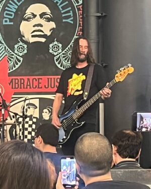 April Schutte Instagram - Well, I finally got to see @dogstarband live 😭 What a gift! (Swipe!) Thank you to @bretdomrose @robmailhouse and Keanu Reeves for giving us this special show at @amoebahollywood !!! I’m forever grateful to my pal, Jax for getting my cd/ticket for me and for @vanessaburgundy for the heads up that the show was happening!! I had to hold back some happy tears but I just kept singing and dancing!!! Hope to get another chance to see them in the future!
.
.
.
#Dogstar #keanu #amoebamusic #bretdomrose #robmailhouse #rockshow