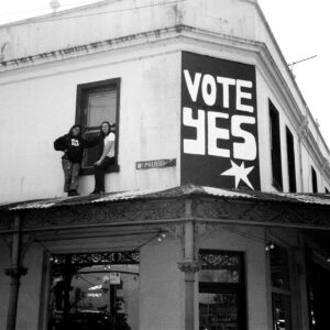 Aretha Brown Instagram - POV: ur Victoria Police lmfaooooo 

Im not allowed to talk about this work which was made on Wednesday (has since been removed ahem) but want to say a big thank you to the deadly owners at @maramawine bar for giving me the opportunity to paint this VOTE YES work regardless. Please go down and have a cheeky bev there because they are awesome people! 

Also want to thank everyone who came to the **KISS MY ART - YES SIGN MAKING DAY at @unassigned_gallery this week. 

These grassroots campaigns (however small and fleeting) is all about connecting with people who feel justifiably cynical about the current political process/politicians, but also about making new connections with people who have never been a part of what Treaty and the Voice to Parliament represents. 

Treaty, as well as the Voice to Parliament - has absolutely nothing to do with race to me. It's about a larger class struggle and serves as a vehicle for anti-capitalist change. Treaty and the Voice to Parliament is larger than identity or race politics - it's a fight between a new vision of politics that provides for all versus a decision to maintain the status quo that only serves the 1%. 

It's NOT about Indigenous and non-Indigenous people being pitted against each other. It's about regular, working class Australians - both bla(c)k and white - fighting together against the wealthy elite and the outdated systems of governing they desperately cling to.

There is absolutely no elected politician in power that will ever care about the interests of Indigenous peoples, or any other working class person if they are indebted to Big Money and corporate greed. 

What I want ultimately is for Aboriginal people to live, study, work, create and eventually retire with economic security and dignity. And because I believe that the only type of freedom one can have is economic freedom, that can only be achieved through a democratically socialist system, that I believe the Voice to Parliament represents. 

VOTE YES TO AN INDIGENOUS VOICE TO PARLIAMENT! 

Photos / Absolute Legends / cool people to follow 
@kate_thomson_artist 
@phoebegreaves 
@tarneeen 
@emmadonovan_music 
@srahlmnna 
@maramawine 
@unassigned_gallery