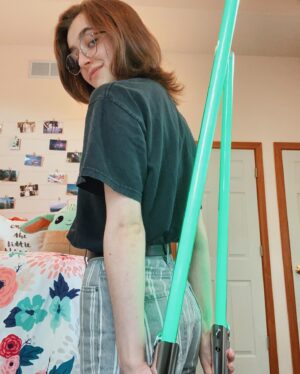 Ashley Boettcher Instagram - Just a girl and her Padawan popping by to say May the 4th be with you 💚
•
How are you celebrating today? Did y’all see the Kenobi trailer that dropped?! So psyched y’all
•
•
•
•
{ ps. Yes, I’ve had this shirt for 4 years. Yes, it’s one of my favorite shirts. No, I’m not getting rid of it. Thank you. #maythe4thbewithyou and happy #starwarsday }