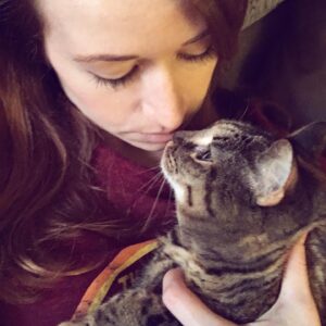 Ashley Clements Instagram - We said goodbye to Perdita this weekend, my beloved companion for 13 years. Cancer took her far too young, but we will always treasure the time we had and what a loving and snuggly cat she was. Her favorite place in the world was in one of our laps. We were as obsessed with her as she was with us, and our hearts are as full as they are broken.