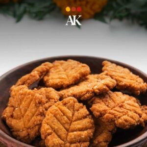 Atul Kochhar Instagram - Sharing recipe of one of the most famous Chhath Puja Prashad- Thekua. Thekua? also known as Khajuria, Tikari and Thokni, is an Indo-Nepalese cookie from the Indian subcontinent, popular in the Indian states of Bihar and Uttar Pradesh and Terai region of Nepal.

Thekua Recipe

1cup wheat flour
1/4 cup white flour/all purpose flour
2 teaspoon ghee
2 cup refined oil
1 cup water
1cup sugar/jaggery
1/2 cup grated coconut
1 teaspoon fennel seeds

Method:
1. Add wheat flour, white flour, grated coconut, fennel seeds, sugar in a bowl. mix it well.
2. Now add ghee and mix it well. Add water to form a knead the dough.
3. Make sure the dough is not too soft. It has to be hard or your Thekua will make like pooris!
4. Shape the Thekua
When the dough is ready, make small balls with your hands. Press them flat, you can use a cookie cutter to give them shape. You can also emboss a design on them if you wish to make them look attractive.
5. Put a kadhai on high flame and heat oil in it. When the oil is hot enough, add a flattened piece of dough and deep fry them till golden brown in colour. You must keep the flame low so that the Thekua is cooked from the inside.
6. Let them cool & store
Thekua is ready! Cool them at room temperature and store in air-tight containers.

Tips
To make the thekua more delicious and soft, knead the dough with more ghee.
You can also add some saffron milk to make it more flavoursome.
You can store it in an airtight container, in a cool and dry place for up to 3 weeks.
Feel free to use jaggery, stevia or sugar free instead of sugar.

#atulkochhar #atulkochharrestaurants #chhathpuja #indianfestival #biharifood #cookies #cookbook #cookierecipe #recipevideo #indiancuisines