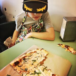 Audrey Marie Anderson Instagram - Hard at work baking with Ann Kirk. Taking a much needed pizza break. #springbreak #pizzabreak
