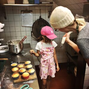Audrey Marie Anderson Instagram - Hard at work baking with Ann Kirk. Taking a much needed pizza break. #springbreak #pizzabreak