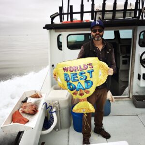 Audrey Marie Anderson Instagram - When I booked this fishing trip I had no idea it was National Go Fishing Day. Yes, that’s a real thing. We all scored and the ceviche is marinating. We also caught this Mylar balloon. Can we please ban these things?? They end up in the ocean, in trees, in places they don’t belong, and how much joy do they really bring? Warner does look really cute holding it, but we can live without this nonsense. #nationalgofishingday