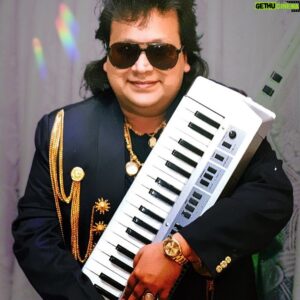 Bappi Lahiri Instagram - Through his music and  fashion, Bappi da created  a mystique that was unique and recognized as such throughout the world.. King of style #bappilahiri