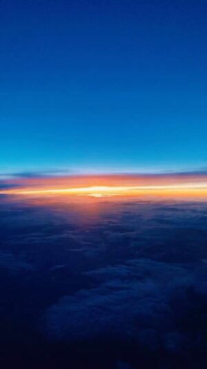 Barry Jenkins Instagram - On this rainy ass day (though we definitely thankful for the water!) reposting the full version of one of my little flight vids that I posted an excerpt of many years ago. Today felt like a good time to revisit, given the LA rain and the fact that IG now allows video posts of more than 59 seconds. 

Just a GLORIOUS sunset. Was flying north from Atlanta to Montreal in the Summer over a carpet of low-lying weather. Eventually I had to put my phone down. 

The purple orange glow stretched towards infinity.