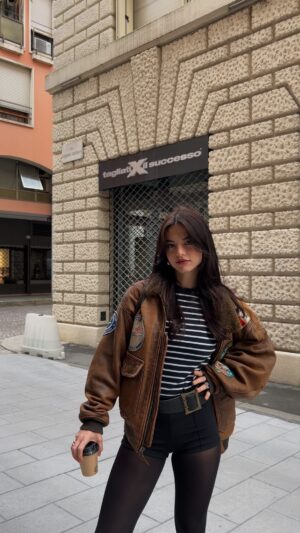 Beatrice Barichella Instagram - today’s fit 

shorts @bershka 
striped long sleeve @uniqloeurope 
vintage leather jacket @luce_vintage_clothing 
vintage leather belt @luce_vintage_clothing 
bag @parfois 
boots @bershka