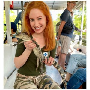 Bekka Prewitt Instagram - Can’t go to a swamp without holding a baby gator 🐊! Yes. Be very careful. 👀 I tried to go incognito by matching the gator. 😜
Joey at @cajunprideswamptours was fun, informative & entertaining!
Visiting @heir_jordans home city!
•
#NewOrleans #Louisiana #NOLA #Gator #alligator #bayou #Swamp #Creole #Jazz #Culture #Music #Roots #Respect #bekkaprewitt #actor #voactor #filmactor #tvactor #pcapactor #voiceactor #model #redhead #ginger #redheaded #gingerhair #redheadlove #animals #travel #boats #tour