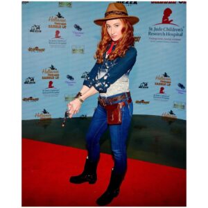 Bekka Prewitt Instagram - What’d ya say to me partner?! 😉 Happy Halloween! 👻🎃
•
Halloween Hotness 2023
@briansikoff almost doubled what he raised last year for @stjude! 👏 
📸: @ichrisbrody 🙏🏻 for these shots!
halloween-hotness.com
•
#halloweenhotness #stjude #redhead #ginger #stjudesheroes #hollywood #madametussauds #halloween #redcarpet #residentevil #residentevilvillage #voactor #belaslittleones #beladimitrescu #mocap #pcap #bekkaprewitt #cowgirls #western #tvactor #filmactor #genuinegingers #redheadmodel #redhair #redheadsofinstagram #gingersofinstagram #redheadlove #gingerlove #redheads #gingers