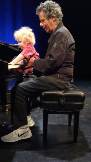 Béla Fleck Instagram - On May 19, 2013 my son Juno was born—three weeks early.  I was across the country, in California and couldn’t get home til early the following morning. I took the red eye from San Fran, with a layover in Dallas. I was sitting in Dallas under the fluorescent lights around four in the morning, waiting for the first flight to Nashville, seriously bummed to have missed the birth, when it occurred to me to pull out my banjo and write a birthday tune to bring home to him. And this tune, based on the syllables of his name, popped out very quickly. I showed it to Chick and it quickly developed into a very playful tune. One of my fondest memories is of Chick sitting at the piano with Juno in his lap, jamming together.

Listen to “Juno,” the newest single from our forthcoming album ‘Remembrance,’ out May 10 on your preferred streaming platform now.
