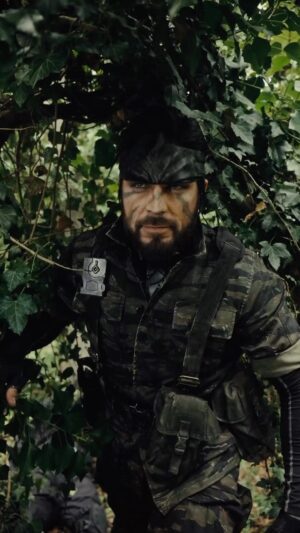 Ben Schamma Instagram - Ad | Me when I saw that the MGS Master Collection is coming October 24th! 😱 We cosplayers all know that instant URGE when we discover a great character, don‘t we? Seeing a potential cosplay for the first time and the focus on the trailer/game/etc is gone, off to researching materials we go. 🏃🏻💨 
Are you excited to become Snake Eater again? 💪🏻 Thank you @konami for the opportunity! 🖤 
DOP: Mark Zheng 
Soldier: Yasin Kamat 
Makeup: Maja Felicitas

#metalgearsolid #mgsvol1 #cosplay #snakeeater #funnyvids #malecosplay #bearded #gaming #goodolddays #cosplaytransformation #makeuptransformation