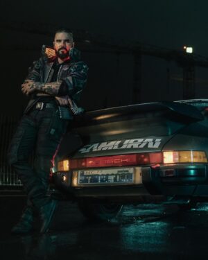Ben Schamma Instagram - Happy birthday Cyberpunk. Such a great game. I fell in love with it from the very first moment. Here is some Cyberpunk stuff we did over the years. Enjoy. ☺️
@vi_dan @andy_long_nguyen @gongbao @stylouz_cosplay @cdpred @cdpr_dach @bmwdeutschland @porsche 
#cyperpunk #cyberpunk2077 #cyberpunkcosplay #cosplay #cosplayer #malecosplay #v #johnnysilverhand #bmw #porsche #matrix #johnwick #fight #martialarts #playstation #xbox #gaming
