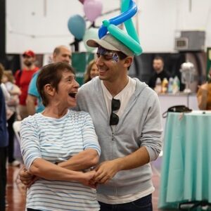 Benj Pasek Instagram - My mom never had a 10th birthday, so for her 70th birthday party, we recreated the 10th birthday she never had! With a gym teacher leading her band of buds in games like sharks and minnows and red rover, dancing in music class, balloon animals, live animals, picture day, face painting, pickle ball, science experiments, art class, and a roving magician, we were all reminded to stay young at heart and bust out our inner child like @khirshpa does every damn day! Happy 10th bday, mama!

Thanks to @originaleventsco for crushing this party!