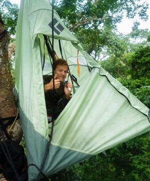 Bertie Gregory Instagram - #CanopyCampLife! Our rope experts @waldo_etherington and @meg_and_onaldson rigged this tree house allowing us to film, sleep and eat high in the trees as the elephants went about their business underneath us. Due to a long history of poaching and their thick jungle home, forest elephants understandably get very grumpy when they bump into humans. So by staying off the forest floor, we could film while the elephants did their thing undisturbed. Also featured in these pics is director @markmcc01 and sound recordist @justdrewsound. 

Many people seem to be very curious as to how we went to the bathroom. It involved a bag, good balance, good aim and careful positioning of the climbing harness straps! Supporting us in the trees, we owe a huge thanks to the local team who put in some serious heavy lifting helping carry in and out the jungle all the ropes, filming platforms and hanging tents. More on them soon! Photographed in @dzanga.sangha National Park for the ‘Elephant Quest’ episode of ‘Animals Up Close’ now streaming on Disney ! #AnimalsUpClose @wildstarfilms @natgeotv @remote_ropes_ltd