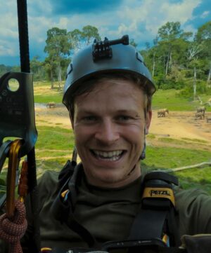 Bertie Gregory Instagram - #CanopyCampLife! Our rope experts @waldo_etherington and @meg_and_onaldson rigged this tree house allowing us to film, sleep and eat high in the trees as the elephants went about their business underneath us. Due to a long history of poaching and their thick jungle home, forest elephants understandably get very grumpy when they bump into humans. So by staying off the forest floor, we could film while the elephants did their thing undisturbed. Also featured in these pics is director @markmcc01 and sound recordist @justdrewsound. 

Many people seem to be very curious as to how we went to the bathroom. It involved a bag, good balance, good aim and careful positioning of the climbing harness straps! Supporting us in the trees, we owe a huge thanks to the local team who put in some serious heavy lifting helping carry in and out the jungle all the ropes, filming platforms and hanging tents. More on them soon! Photographed in @dzanga.sangha National Park for the ‘Elephant Quest’ episode of ‘Animals Up Close’ now streaming on Disney ! #AnimalsUpClose @wildstarfilms @natgeotv @remote_ropes_ltd