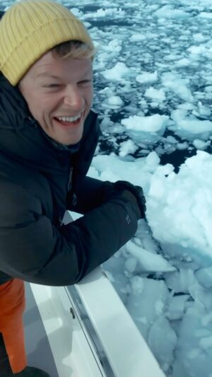Bertie Gregory Instagram - During the search for the wave-washing killer whales, we had several close calls with ice. The wave-washers or ‘B1s’ love hunting in ice so to have any chance of filming them, we needed to follow them into the ice fields. The wind and currents constantly reshuffle the ice into a very intimidating jigsaw. During a rather stressful 30 minutes we got stuck, but Captain Ben Wallis of @oceanexpeditions skilfully manoeuvred his 75ft ice strengthened sailboat out into more open water. That meant I could then enjoy the noise of the ice scraping down the hull! Shot of me by Will West and sound by @zubinsarosh. To see us get really stuck, check out the killer whale episode of #AnimalsUpClose now streaming on Disney ! @wildstarfilms @natgeo