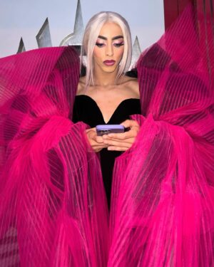 Bilal Hassani Instagram - Come on Barbie !

Our take on Barbie’s wonderful world, through to the amazing work of @harris_reed for @ninaricci and @louboutinworld.

Special thanks to @oziasparis for the custom B(arb)ilal bag!

Assisted by @jnrc_ 
Hair by @dorianjollet 
MU by @clotildemakeupartist