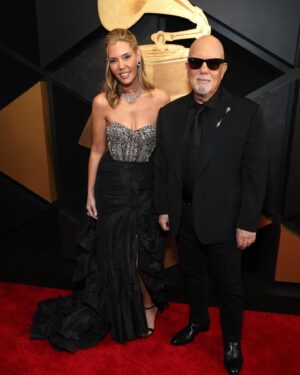 Billy Joel Instagram - We. Are. Here. Billy and Alexis Joel on the #GRAMMYs Red Carpet with their 2 daughters, Della and Remy, and producer @freddywexler. Billy is performing his new single, ‘Turn the Lights Back On’ tonight! 

📷 Frazier Harrison, @kevinmazur  @gettyentertainment @recordingacademy