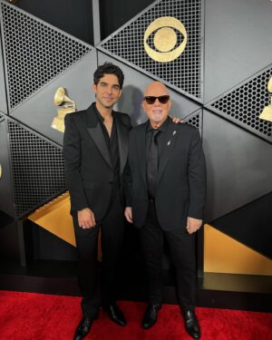 Billy Joel Instagram - We. Are. Here. Billy and Alexis Joel on the #GRAMMYs Red Carpet with their 2 daughters, Della and Remy, and producer @freddywexler. Billy is performing his new single, ‘Turn the Lights Back On’ tonight! 

📷 Frazier Harrison, @kevinmazur  @gettyentertainment @recordingacademy