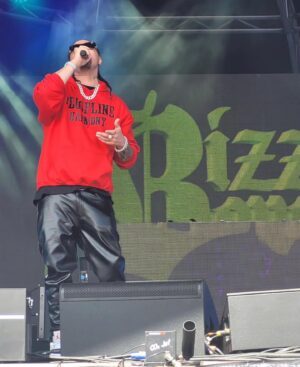 Bizzy Bone Instagram - Amazing show last night. I didn’t really know how i did. 
Then i started receiving footage from the people who attended. Wow. I was just giving it my all. You never really know when u up there how your doing. Just locked in. 
I can’t even explain how much the people out here love BONE. Each member. Wether solo or not. The love out here is something i have not felt in a very very long time. Stepping away for awhile to get my children’s careers together has been a journey. I know ya’ll understand what i am doing. I hear the bullsht as well (2nd slide) always gon be haters #mrrogersneighborhood 🤭. The group is gonna be just fine. Imma shut it down real quick. With talent. With Grace. Its that simple. Long live Bone Thugs n Harmony. Imma keep saying it. Until its backwards baby!!!!!!! 
@juicyfest.co we are just getting started. Buckle up for safety mates 😁. 
P.S. @ybl_sinatra went awf! Proud of my son. Very proud. 
Im on Daddytime. Not 😈 time. See how i did that? 
NEW ZEALAND & AUSTRALIA I F’N LOVE YOU! 
Im here lets gooooooooo!!!!!!
God be with me lets set this MF awf! 
P.S. to clarify slide 2 is for you haters out there. If you feel some kinda of way then …. That uh definitely be you. Ya’ll do not care as much as i do and are not ready to throw down for this sht or my niggaz. I AM! 
I got Water bottles for all yall. 😆😆😆😆😆
Its all good frfr. Lighten up because i am having a ball out here. Too blessed to be upset at all. 
Enjoy. ✌🏽