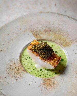 Björn Frantzén Instagram - Kinki from Fukuoka served with Zén Réserve caviar, fermented fennel & white asparagus at @restaurantzen.sgp