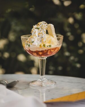 Björn Frantzén Instagram - Eton mess - Swedish apples, cardamom mousse, punsch syrup, lemon thyme and yoghurt sorbet @brasserieastoria