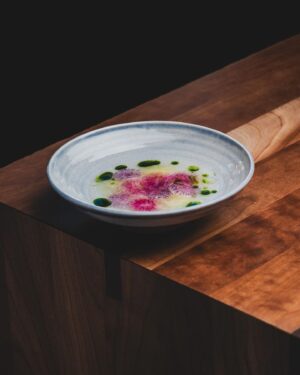 Björn Frantzén Instagram - Crudo: hamachi, tangelo, radish & marjoram - First serving in the dining room.

Sliced radishes for texture to the dish. Tangelo, which is a mix of mandarin, grapefruit, and pomelo, is fermented, and parts of it are used to create a vinaigrette with dashi and lime. The dish is finished with two oils: citrus leaf oil and marjoram oil @restaurantfrantzen