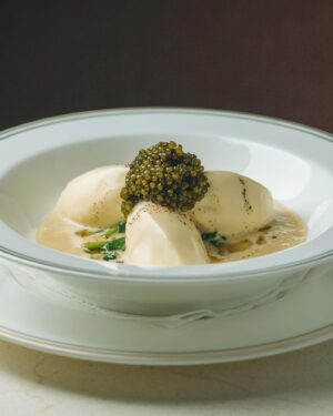 Björn Frantzén Instagram - Scallop quenelle, caviar, sauce vin jaune & barley koji butter @brasserieastoria.sg ⚡️⚡️⚡️