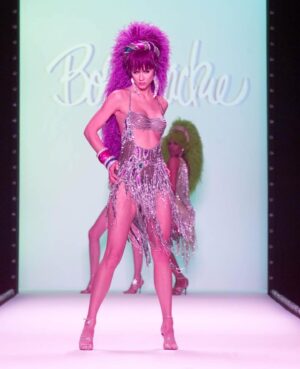 Bob Mackie Instagram - @mileycyrus wears a Bob Mackie couture silver bugle-beaded strip dress, from his 2002 ‘To Broadway With Love’ collection. Congrats on your Grammy win, Miley! xo Bob

Styled by: @bradleykennethstyle 

#bobmackie #grammys2024 #mackiemagic #mileycyrus