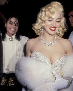 Bob Mackie Instagram - @madonna wears a Bob Mackie couture gown and white stole to the 63rd Annual Academy Awards in 1991. #MichaelJackson was her date for the evening. #MackieMagic #Oscars