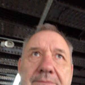 Bob Mortimer Instagram - Train Guy...Orange Polo Neck