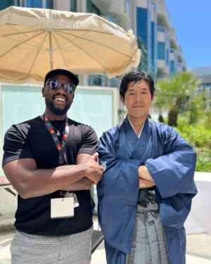 Bonko Khoza Instagram - One of my most favourite moments in Cannes was when I got taken on a tour of the @dpa_lounges at the Marriot where I met some incredible entrepreneurs and artisans. A truly memorable part of it was experiencing the @hinomoto.org369 a group of artists and artisans from Japan. I got to meet @hidehiranezukei a swordsmith from Japan who makes traditional Samurai swords. I was told that when he makes them, he instills a spirit into the sword giving it a life of its own, so when you hold the sword, you feel its spirit/presence and can even engage with it.  Sounds very esoteric but it’s true. 

When I held that sword, I closed my eyes and felt like I was standing in the presence of a gentle but powerful giant. They reassured me that that was probably the spirit of the sword. @mandlakayise_dube went through the day before and I remember how he kept saying how deep the experience was. And it really was. I’m pretty sure there ls a deep unspoken connection between African and Japanese culture. Somewhere somehow, I’m sure of it. 

#cannesfilmfestival #dpaloungesgiftsuite #dpalounges