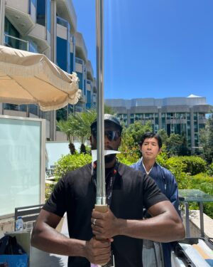 Bonko Khoza Instagram - One of my most favourite moments in Cannes was when I got taken on a tour of the @dpa_lounges at the Marriot where I met some incredible entrepreneurs and artisans. A truly memorable part of it was experiencing the @hinomoto.org369 a group of artists and artisans from Japan. I got to meet @hidehiranezukei a swordsmith from Japan who makes traditional Samurai swords. I was told that when he makes them, he instills a spirit into the sword giving it a life of its own, so when you hold the sword, you feel its spirit/presence and can even engage with it.  Sounds very esoteric but it’s true. 

When I held that sword, I closed my eyes and felt like I was standing in the presence of a gentle but powerful giant. They reassured me that that was probably the spirit of the sword. @mandlakayise_dube went through the day before and I remember how he kept saying how deep the experience was. And it really was. I’m pretty sure there ls a deep unspoken connection between African and Japanese culture. Somewhere somehow, I’m sure of it. 

#cannesfilmfestival #dpaloungesgiftsuite #dpalounges