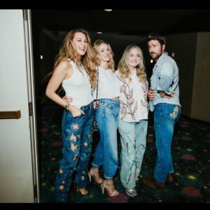 Brandon Sklenar Instagram - If audiences had half the amount of fun we did, we’re gonna put theme parks outta business. 🤩 In 20 years of doing this, I don’t think I’ve ever experienced anything quite like surprising 2500 fans with an early preview of @itendswithusmovie 🙏 to everyone who showed up in their floral jeans alongside us, including @brandonsklenar (jeans handmade by me & @isabela.ferrer 🌸🤩 🌸)
@colleenhoover being MOTHER in every way, turning it OUT for everyone at @book.bonanza 
I loved eating delicious food with @alexsaks &co. Drinking alarming amounts of coffee. Bringing the hottest plus one, my mother in law @tamtam1944 The highlight though was when I got to style sweet @isabela.ferrer in my clothes because she came straight from her job at a restaurant in Brooklyn to this mayhem bc @colleenhoover and I begged her to just hop on a plane. The best weekend, and this is only the beginning…

Final shout out to my angel hair and makeup team for jumping in and helping all my ladies, @vivianbaker and @jennifer_yepez 🩷

📸: the incredible @byjadegreene