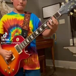 Brett Favre Instagram - My grandson Parker hung up the cleats for a guitar but who knows 🤔🤔Monday night national anthem maybe…..