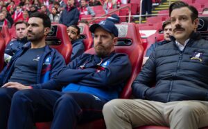 Brett Goldstein Instagram - Ted Lasso Episode 6 is out now on @appletv and is written by the phenomenal Coach Beard himself @brendanhunting. No spoilers but judging by these pictures, Roy, Beard and Ted have a frown off, Jamie and Roy perfect running in slow motion and Jamie shows Roy the first part of the YMCA dance. It’s a smasher. Directed by the wonderful @mattlipsey123. #tedlasso #brendanhunt #appletvplus #amsterdam