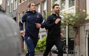Brett Goldstein Instagram - Ted Lasso Episode 6 is out now on @appletv and is written by the phenomenal Coach Beard himself @brendanhunting. No spoilers but judging by these pictures, Roy, Beard and Ted have a frown off, Jamie and Roy perfect running in slow motion and Jamie shows Roy the first part of the YMCA dance. It’s a smasher. Directed by the wonderful @mattlipsey123. #tedlasso #brendanhunt #appletvplus #amsterdam