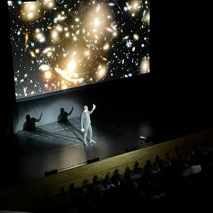 Brian Cox Instagram - A shot from our Horizons warm-up show in Reading. Here you can see multiple galaxy clusters and light being bent due to gravitational effects.  While this image looks full of galazies, each with hundreds of billions of stars, the fact is that most of the universe is pretty empty.