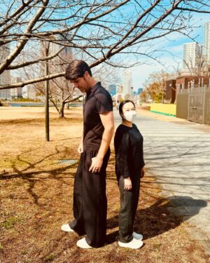 Brian Patrick Flynn Instagram - Lessons in scale and proportion, from Japan. Nao is 5’0, and I am 6’5. We have to project our voices up and down to one another nonstop. Also, when you greet someone here, remember to say konichiwa, not sayonara. Sayonara means goodbye whereas konichiwa means hello; the reason I’m aware of this is because I’ve been doing them both wrong in taxis for nine days. I know, I had ONE job. FML.