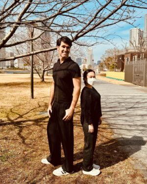 Brian Patrick Flynn Instagram - Lessons in scale and proportion, from Japan. Nao is 5’0, and I am 6’5. We have to project our voices up and down to one another nonstop. Also, when you greet someone here, remember to say konichiwa, not sayonara. Sayonara means goodbye whereas konichiwa means hello; the reason I’m aware of this is because I’ve been doing them both wrong in taxis for nine days. I know, I had ONE job. FML.