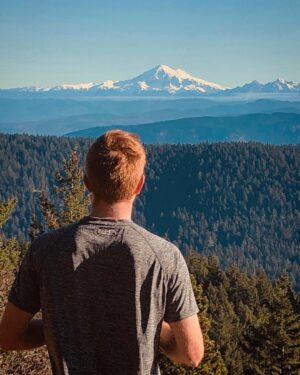 Bryce Eilenberg Instagram - Made a “wrong” turn running the trails with @mikerediker in Moran State Park on Orcas Island and ended up at the top of a mountain with this absurd view of Mt. Baker (thanks for the catch @helicase1988) after running through essentially Middle Earth level mystical forests.  Half expected some wood elves to pop out at me.  But no, just some Black-tailed Deer getting some lunch in a pasture.  Gotta come back up with something better than a phone camera.  This place is awesome.