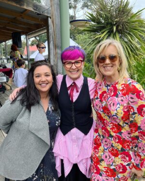 Cal Wilson Instagram - Congratulations @geraldinehickey and @cath_southgippslandcelebrant - your wedding was so filled with love and joy and wonderful people, and so absolutely you. So happy I got to be there to share it with you. 

(Image 1: 3 women standing together beaming. Cath, Bride 1, dressed in a gorgeous white beaded gown she made HERSELF, Geraldine Bride 2 in an incredible pink custom @reignerclothing suit adorned with embroidery and pearls, and a sassy veil. 
Cal is wearing a pink pinstriped @show_e_official shirt, and black @etalaustralia waistcoat and pants. This wasn’t meant to be a clothing crediting thing, I’ll stop now (except my nifty neck bow thing is courtesy @elenimstyling). 
Cal is holding a colourfully decorated Wedding album she made and foisted on the Brides. 

Image 2: 3 beaming women. Cal is in the middle with her arms around beloved mates @thegemmola and @theclairehooper. There’s a lot of great hair going on. 

Image 3: 3 Beaming women. Cal is in the middle with her arms around darling friends, Ranger Elle and @kirstywebeck. They’re standing next to a mirrored welcome to the wedding sign. Webeck’s boots are similarly mirror glaze.

Image 4: 2 women, one beaming, (the lovely @nic_minstergram) other one,  Cal, almost growling with the fury of how happy she is to be seeing Nicolette. They are hugging. Cal is winning)