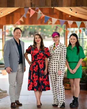 Cal Wilson Instagram - All right, you Cake Hounds and Biscuit Supporters! @bakeoffau starts tomorrow on @foxtel at 8.30pm. 

Can’t wait for you to get to know our 12 fabulous bakers, and fall in love with my delightful cake mates @rachelkhooks, @darrenpurchese and @natalie.tran

(Image: The Bake Off Shed, a glowing magical place with colourful bunting draped about. 
Four extremely happy, and well dressed, people stand together, smiling: @darrenpurchese, @rachelkhooks, Cal, and @natalie.tran. They are aglow with excitement and the promise of exquisite bakes to come. 
Not pictured: the skill and speed with which Cal can liberate a biscuit from a baker’s bench) 

Hair and Make Up @juliecooper_makeup 
Styling @elenimstyling 

#GABO #BakeOffAu #Foxtel