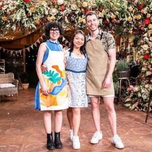 Cal Wilson Instagram - Can’t believe it’s the Finale of @bakeoffau tonight! Truly my favourite ever gig. 
The glorious @maggie_beer returns for a delightful bit of judgery, and our amazing final 3 bake their socks off. 
8.30 tonight on @foxtel and @binge 

#GABO #BakeOff #Finale #Baking #GreatAustralianBakeOff
 
(Images: 1: five smiling people, dashingly attired, stand at the front of the Bake Off Shed. @darrenpurchese, @rachelkhooks, @maggie_beer, Cal, and @natalie.tran. Cal can’t speak for the others, but she is just a little star struck by Maggie, and quite covetous of her amazing orange earrings. 

Image 2: Natalie and Cal stand smiling with their arms around each other, next to some utterly incredible foliage, in the shed. Cal is wearing a great suit, Natalie, a particularly stunning dress. They look like a fascinating power couple. 

Image 3: the reverse of the first image: the backs of our intrepid hosts and judges. It’s a sort of poignant goodbye, reflecting that this is the last episode of this season, oh god I’m not ready. 

Image 4: our mighty final 3 bakers, @ilonabakes, @lozfozbakes, and @whatsadambaking. They have their arms around each other and are standing beneath the foliage festooned arch decorating the shed. It looks so good in there, I wanted to get married again, and have the top 3 cater the  wedding That Day. 
Couldn’t be prouder of these creative, talented, generous, lovely people)