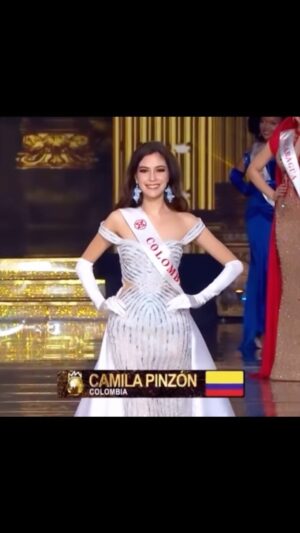 Camila Pinzón Instagram - Honored to carry the name of my beloved country on my chest 💙 Gracias Colombia los amo. 
Dress: @fernando_marinm @eurocristal 
Aretes: @byvizcarra