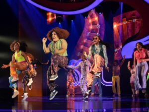 Camille A. Brown Instagram - HAPPY OPENING to the cast, creative team, and production crew of Hippest Trip- The Soul Train musical- Written by @domorisseau Directed by @kamilahf  Music Supervision, Orchestrations, and Arrangements by @kennyjseymour , and Choreographed by cab ☺️ My parents remember the very first airing of Soul Train. It was the first time they had seen reflections of themselves moving and grooving in a space all their own that shined with excellence. They passed their love for the show onto me. It had a tremendous impact on my love of social dance and how it is history in motion. It has been my honor to be the choreographer for this musical, to celebrate the legacy of Soul Train, to lift up the incomparable dancers who moved with bold creativity and innovation, celebrate the African diasporic language, and to create in a space filled with both joy and rigor. Kamilah and Dominique have always been inspirations to me as Black women navigating the arts, but to be in the space of collaboration with them has truly lifted and encouraged my spirit. I thank them for their sisterhood. Shout out to my team @adesolaosakalumi and @rickeytripp . Thank you for your love, your laughter, and your care. Thank you for having my back and always lookin out. I love us. Shout out to the amazing @zanemark . I am so thankful for your love and support. Thank you @moncelldurden for being with us during the early stages. 
To the cast, thank you for putting ALL of yourselves in the space every time- for trusting the destination and always being so encouraging throughout the process. Your affirmations helped me so much! 

Special thanks to Richard Gay, Jeffrey Tick, Matt Weaver, Tony Cornelius, and Pam Brown. Thank you for the journey and inspiration. 

Cheers to the cast of Hippest Trip for keeping the legacy alive and cheers to all those souls who kept Soul Train alive for so many decades.
This show is a celebration of legacy. IT’S TIME TO GET DOWN as we lift it up!

Photo courtesy of ACT 

 @jasonsherwooddesign (Scenic Designer), @dedeayitedesign (Costume Designer), @jen.schriever   (Lighting Designer), @siraaronrhyne (Projection Designer), Mia Neal (Wigs Designer) 

Continued in the comments!!
