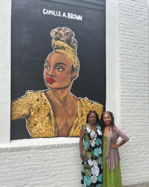 Camille A. Brown Instagram - I have always been proud to represent Southeast Jamaica, Queens, New York! “Queens is in da buildin!!!’” A very special thank you to  @jamaicaartscenter for including me in this series and for this massive acknowledgment! Many thanks to JCAL's Executive Director, Leonard Jacobs, JCAL's Artistic Director, Courtney Ffrench , NYC Parks Department Senior Public Art Coordinator, Elizabeth Masella, and Wendy A. Berot. Council Member, Nantasha Williams, District Leader and former Council Member, I. Daneek Miller, NYC Parks Queens Borough Commissioner, Michael Dockett

I am very honored to be on the wall with LL COOL J, Sweet Tee, Q-Tip, Jackie Robinson, Gregg Vance (Coach Chuck), Lani Guinier, W. E. B Du Bois, Naomi Osaka, and Count Basie! 

And shout out to the super talented artists who created the murals: 

Eric Black 
Justice Levenson 
Tyler Blau (LAG!) 
Nicole Wang 

Original pic by @josefinasantos 

Shout out to my family and dance family who came out to support! 

I was asked what was my hope when Black youth look at this mural. That all things are possible and to BELIEVE!!! There will always be challenges, but keep living your dreams, shoot for the universe, and be yourself in all spaces.

If you’re ever in Jamaica, Queens stop by Daniel O'Connell Playground and check out
#queensreflections 

Gratitude!
