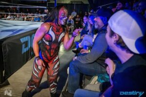 Camille Ligon Instagram - Just a friendly convo with a fan, cause Holi is always and forever a woman of the people 😈😈

P.S. I always see yal looking, witcho looking
 a$$es 👋🏽💀

📸 @weissshotme

#thirstythursday #holidead #peepers #Jeezy #photogenic #photography #womenswrestling #supportindywrestling #supportwomenswrestling #Canada #destinywrestling